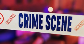 crime-scene-boundary-tape-with-blurred-background-2026-01-09-09-40-25-utc
