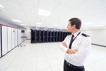 security-guard-in-server-room-watching-data-2026-01-11-09-54-18-utc