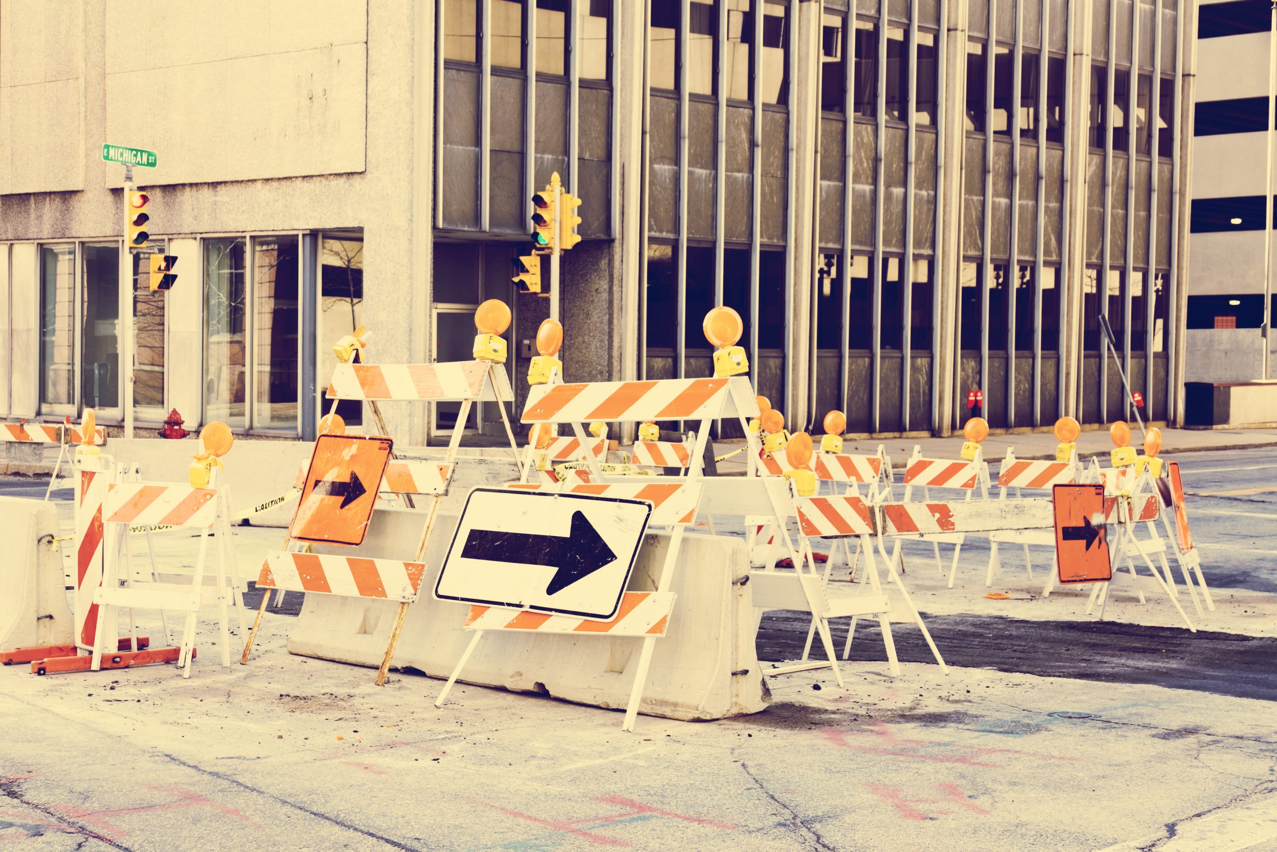 construction-barriers-block-street-in-urban-downto-2026-03-26-11-36-45-utc